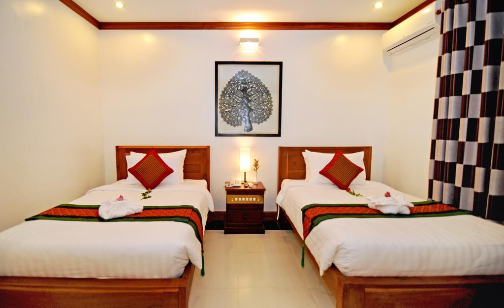 Visoth Boutique Siem Reap Quarto foto