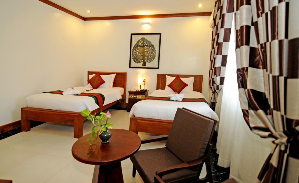 Visoth Boutique Siem Reap Quarto foto